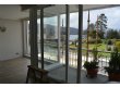 White patio door overlooking Lake Windermere